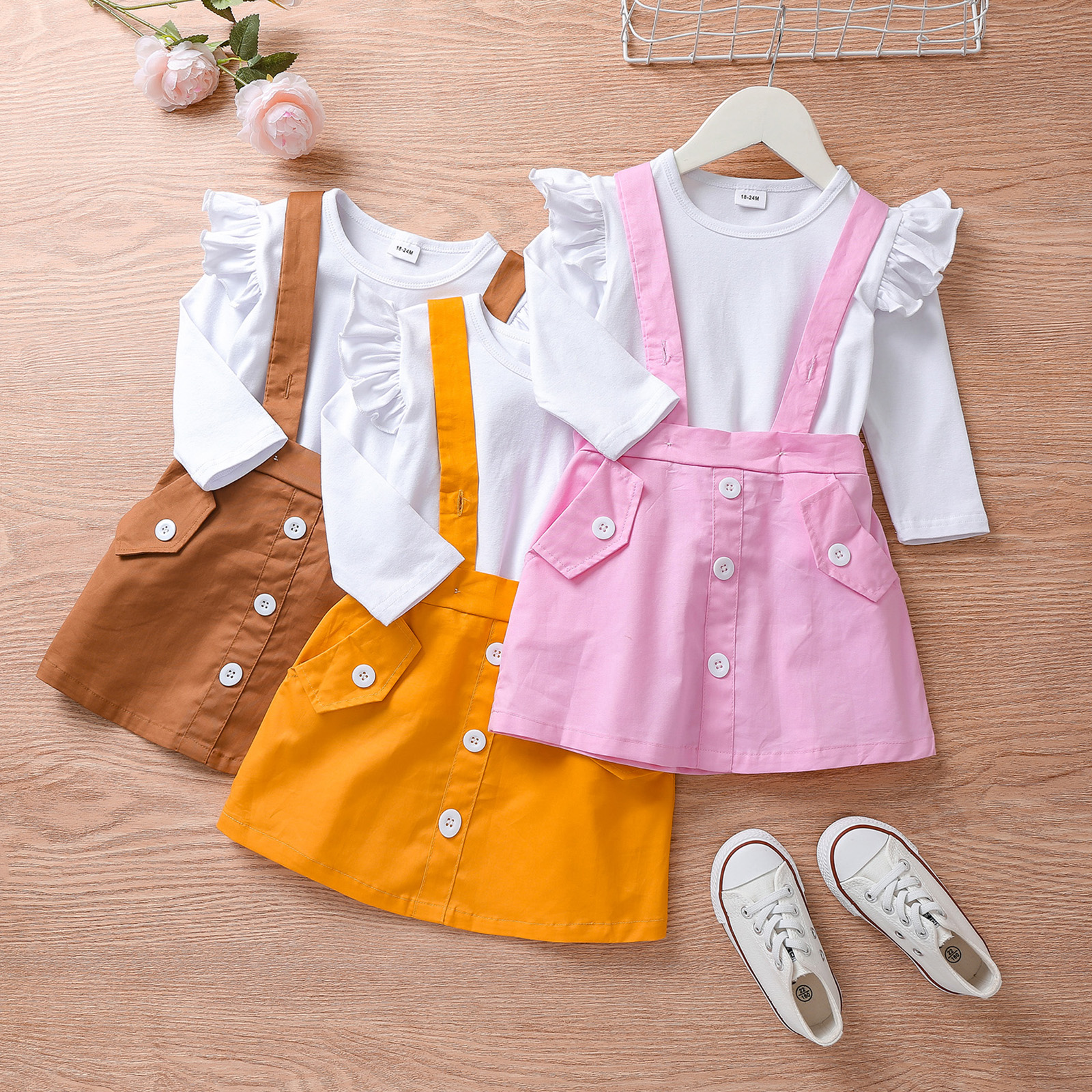 

2-piece Toddler Girl Ruffled Long-sleeve White Tee and Button Design Suspender Skirt Set
