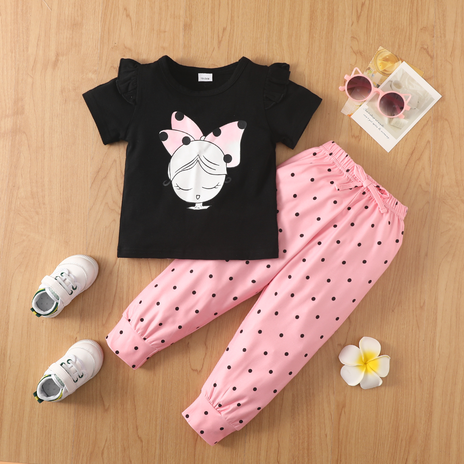 

2-piece Toddler Girl 100% Cotton Figure Print Ruffled Black Tee and Bowknot Design Polka dots Pink Pants Set