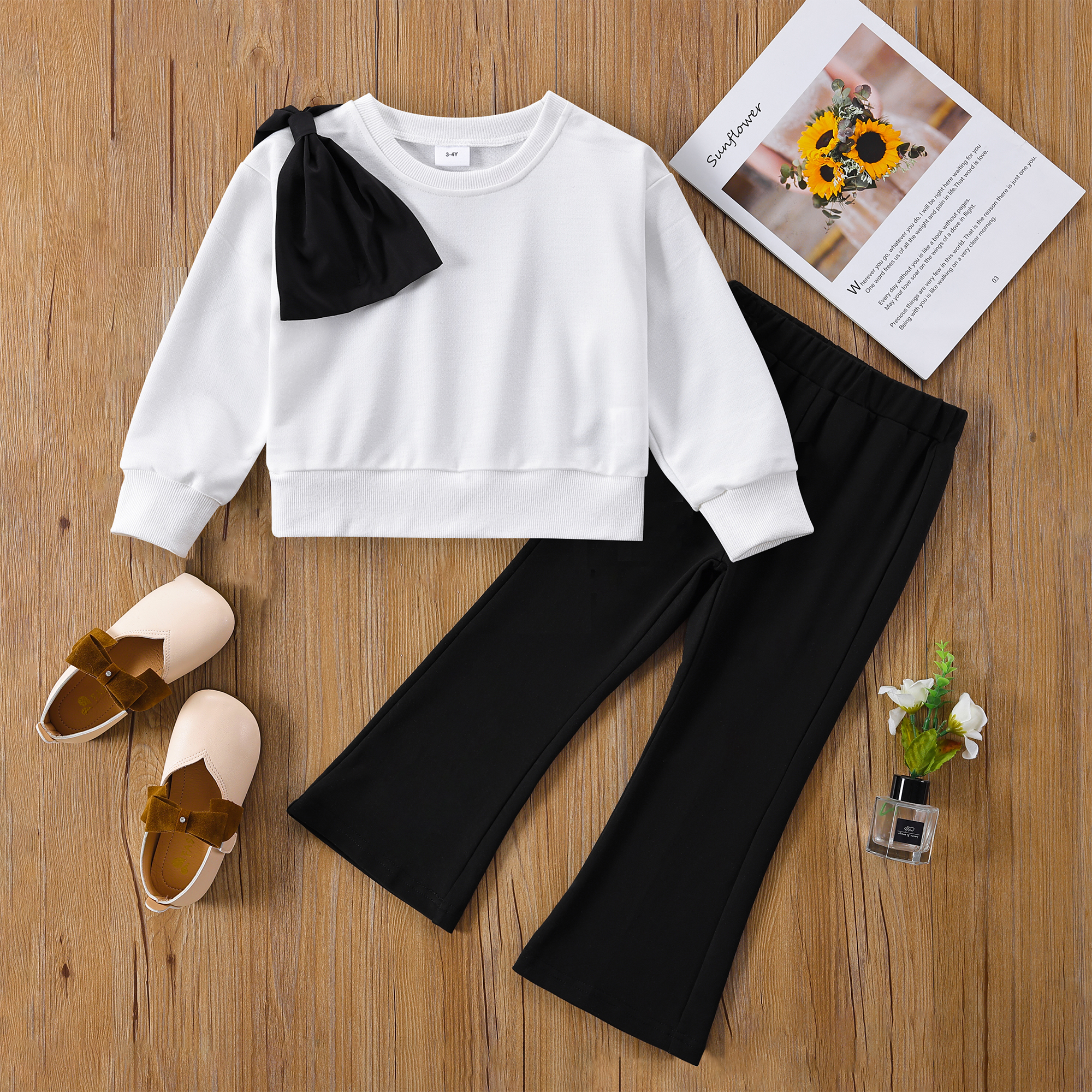

2-piece Toddler Girl Bowknot Design White Pullover and Black Flared Pants Set