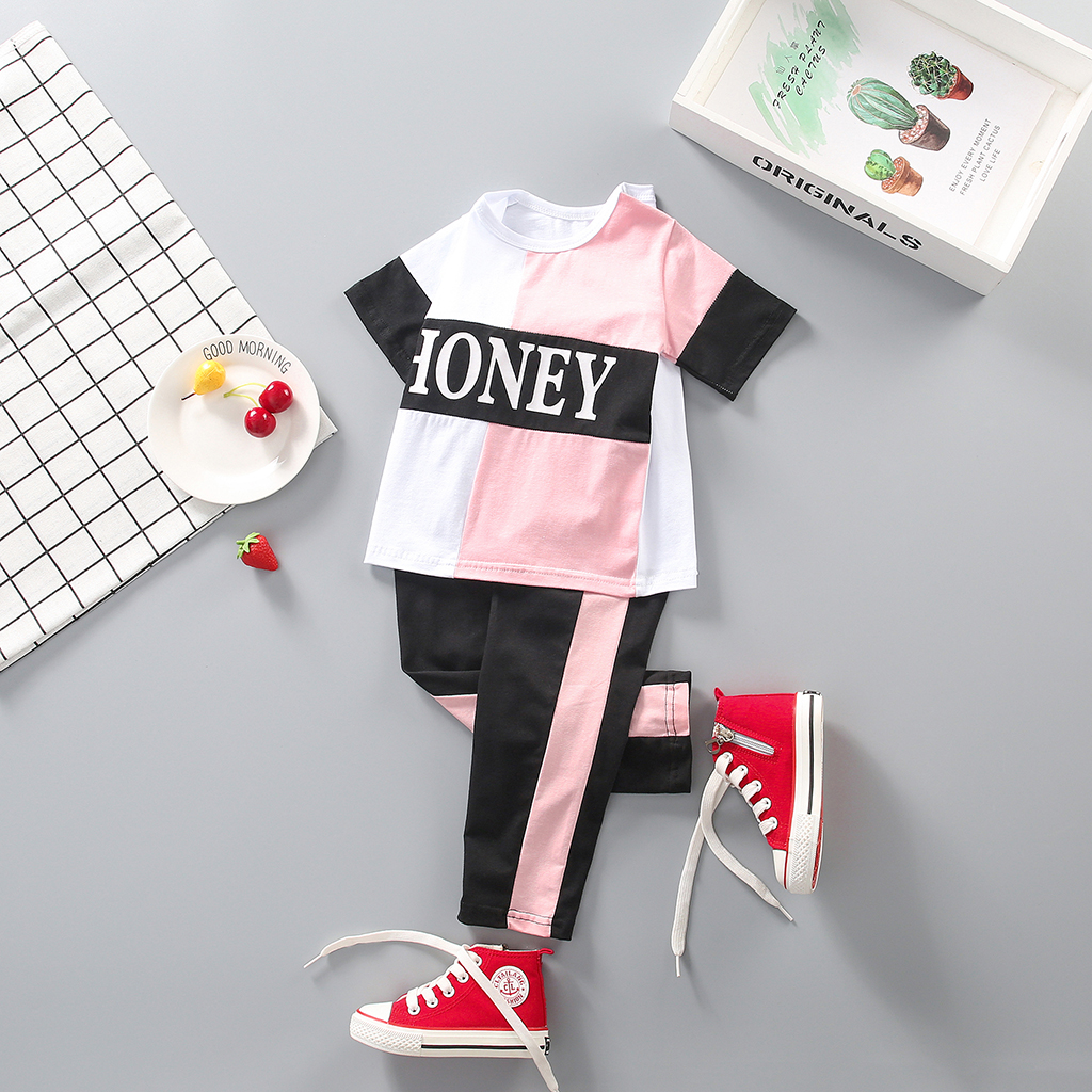 

2-piece Baby / Toddler Girl Letter Print Colorblock Tee and Pants Set