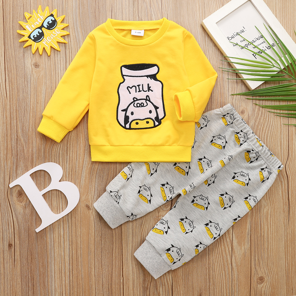 

2pcs Baby Boy Cartoon Cow Pattern Yellow Long-sleeve Sweatshirt and Trousers Set
