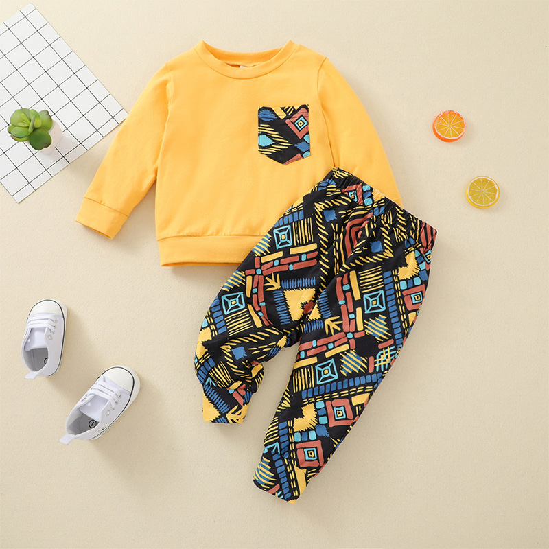 

Baby 2pcs Yellow Long-sleeve Sweatshirt and Graphic Print Trouser Set