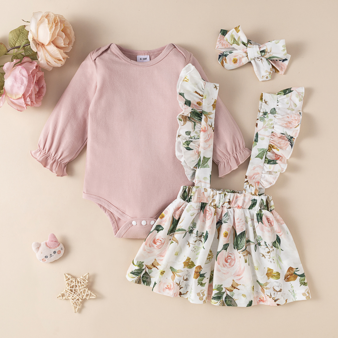 

3pcs Baby Girl Pink Long-sleeve Romper and All Over Floral Print Ruffle Suspender Skirt Set