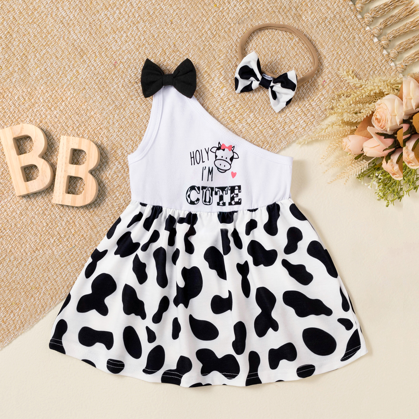 

2pcs Baby Girl Letter and Cow Print One Shoulder Sleeveless Dress with Headband Set
