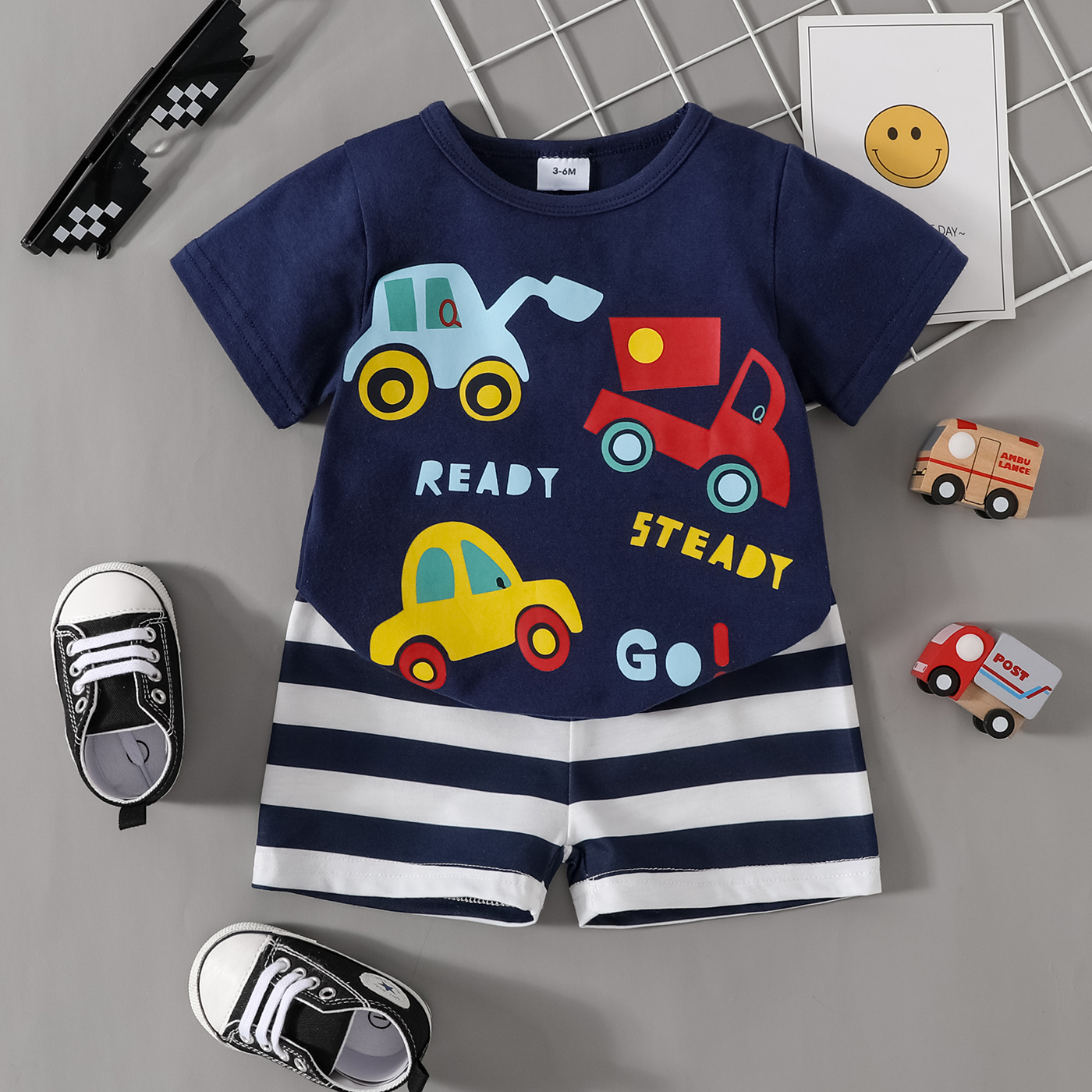

2pcs Baby Boy Cartoon Vehicle and Letter Print Short-sleeve T-shirt with Striped Shorts Set