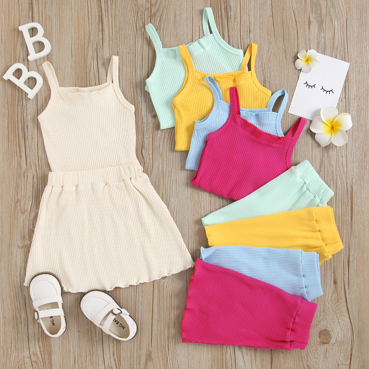 

2-piece Toddler Girl Solid Color Ribbed Strap Tank Top and Skirt Set