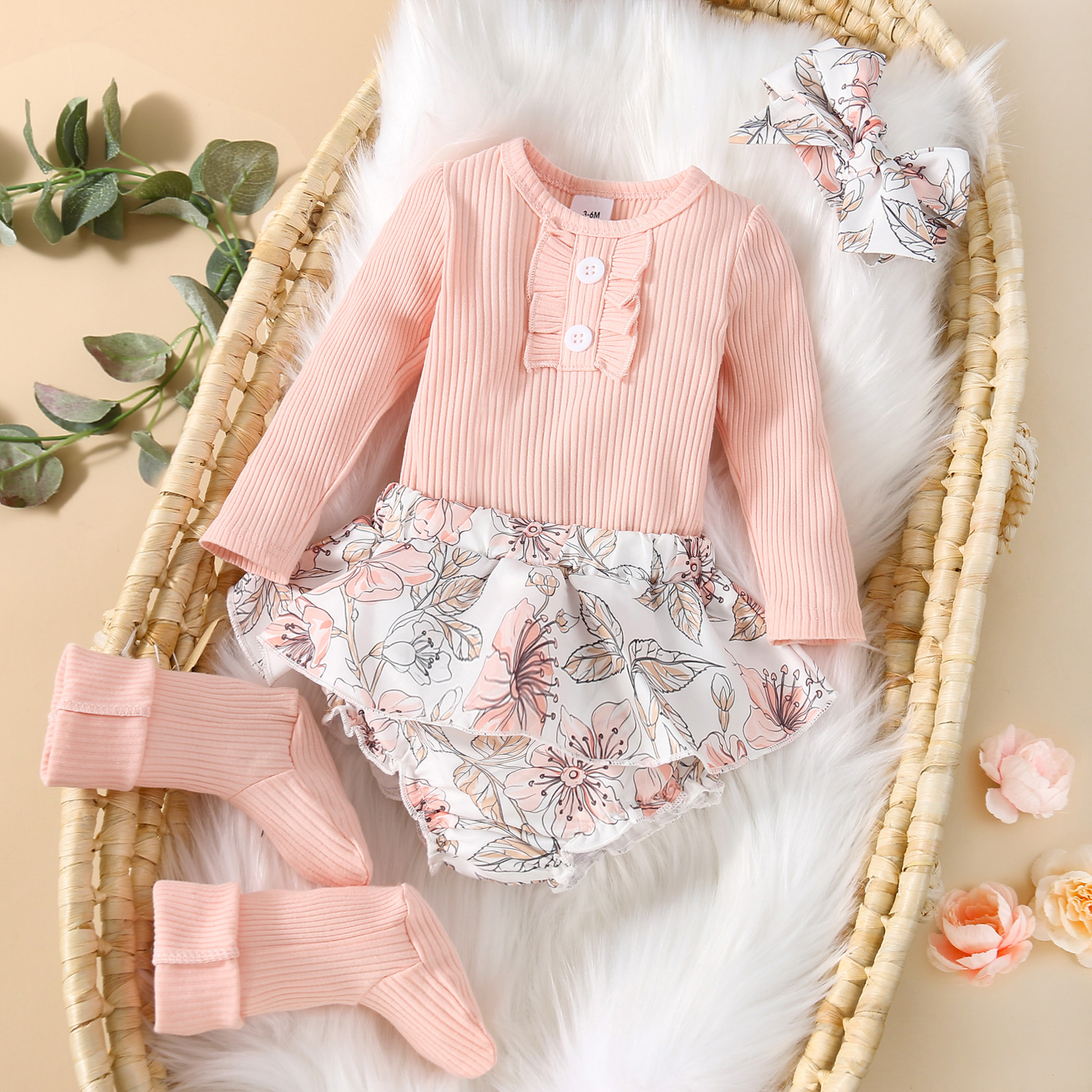 

4pcs Baby Pink Ribbed Long-sleeve Romper and Floral Print Ruffle Shorts with Socks Set