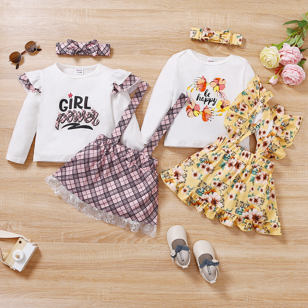 

2-piece Toddler Girl Letter Print Long-sleeve Top and Floral Print/Plaid Suspender Skirt Set