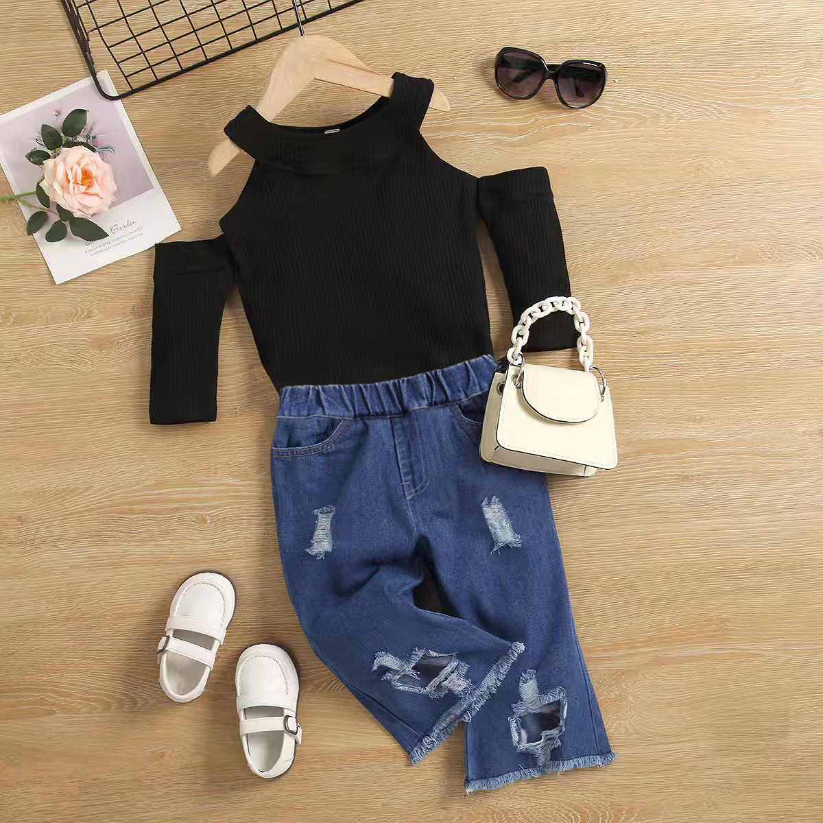 

2pcs Toddler Girl Trendy Ripped Denim Jeans and Cold Shoulder Long-sleeve Tee Set