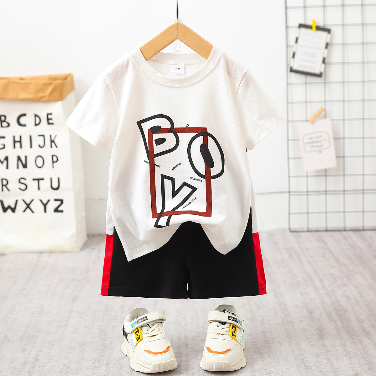 

2pcs Toddler Boy Casual Letter Print White Tee & Colorblock Shorts Set