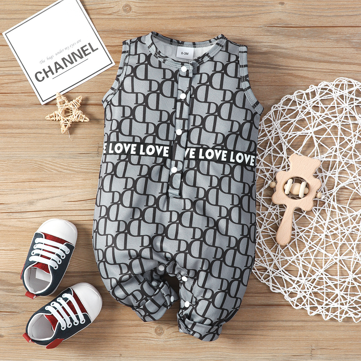 

Baby Boy All Over Letter Print Sleeveless Snap Jumpsuit