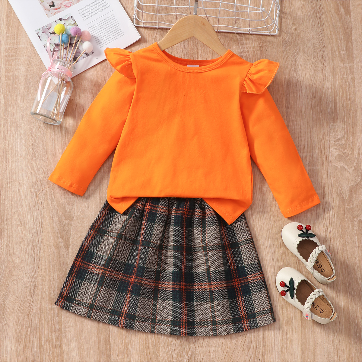 

2pcs Toddler Girl Ruffled Long-sleeve Orange Tee and Plaid Skirt Set