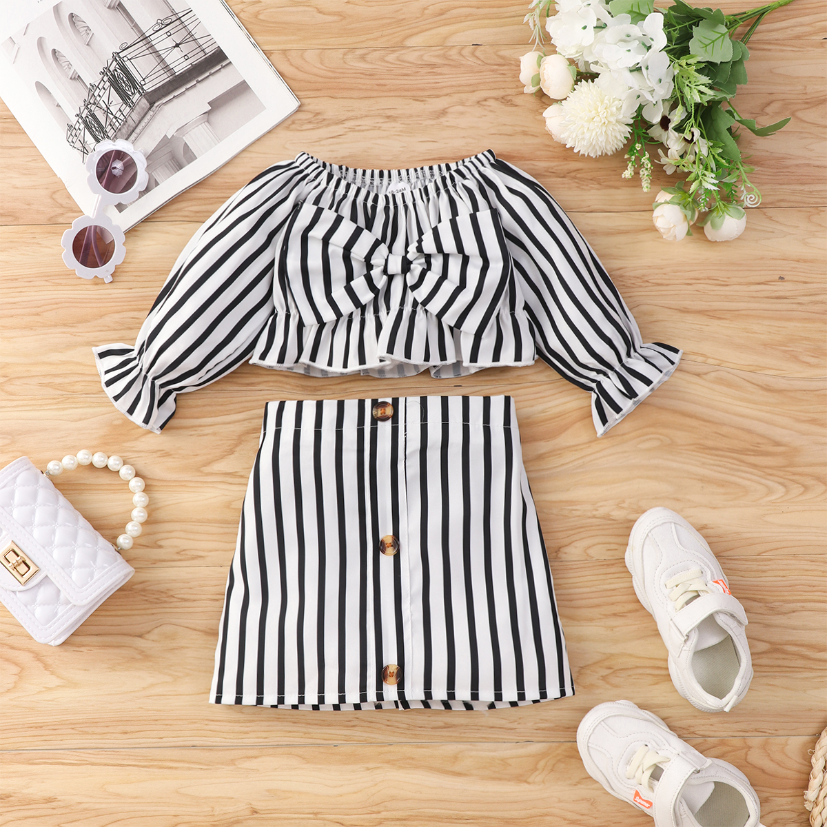 

2pcs Toddler Girl Stripe Bowknot Design Long-sleeve Blouse and Button Design Skirt Set